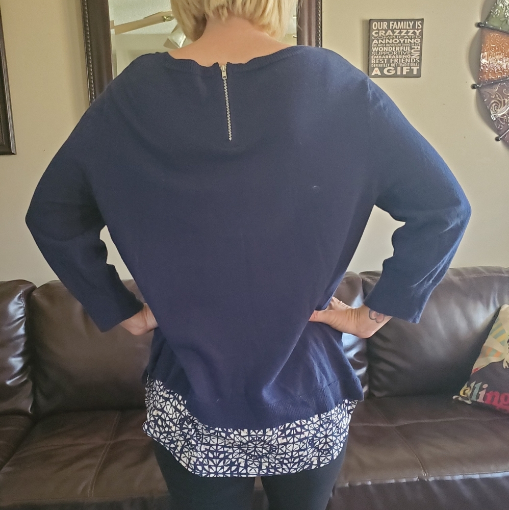 Cute blue sweater with peak a boo bottom